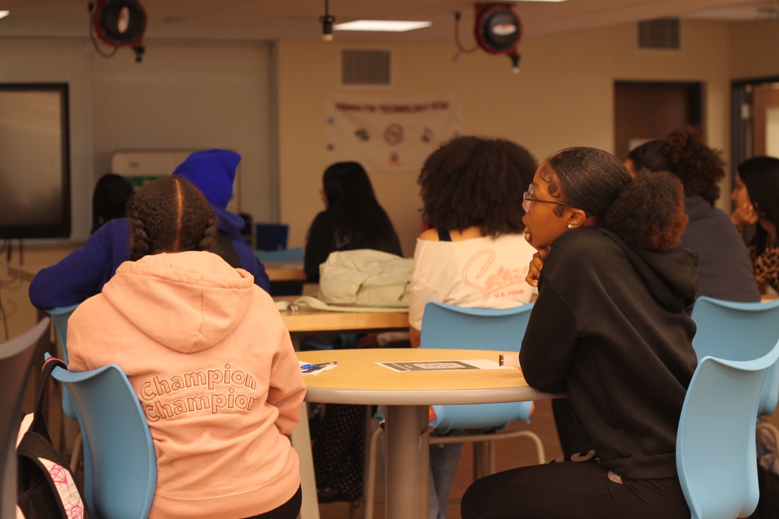Students listen during an I-CARE career-awareness presentation.